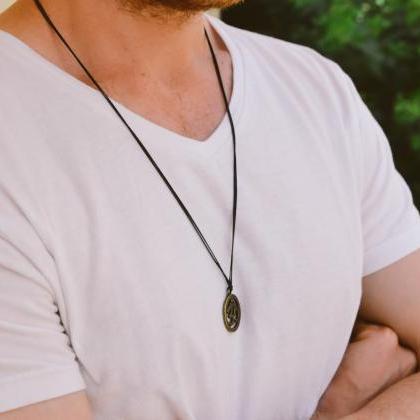 Men's necklace with a black cord an..
